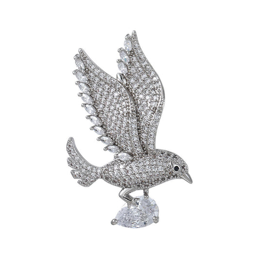 Silver plated bird brooch with crystal gems | BeautiquePoint