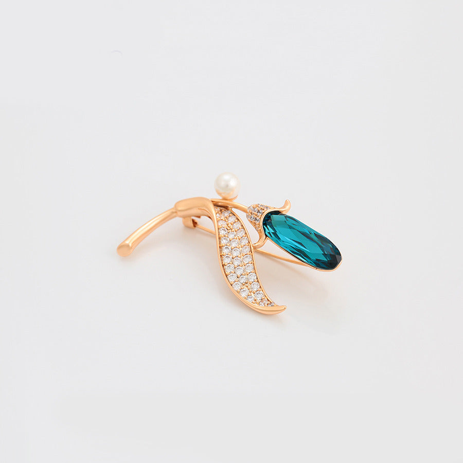 18k gold-plated brooch in the shape of tulip with blue crystal - view from different angle - beautiquepoint.com