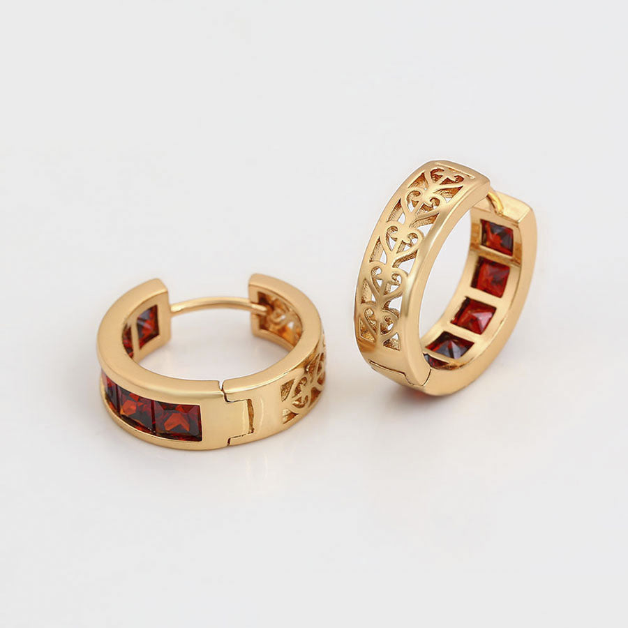 Gold-plated huggie earrings with red crystals - view from different angle - beautiquepoint.com