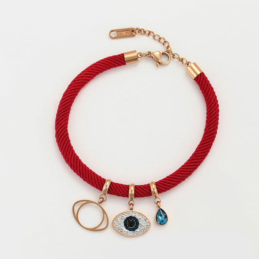 Red String Bracelet with blue crystal, two eye symbol - beautiquepoint.com