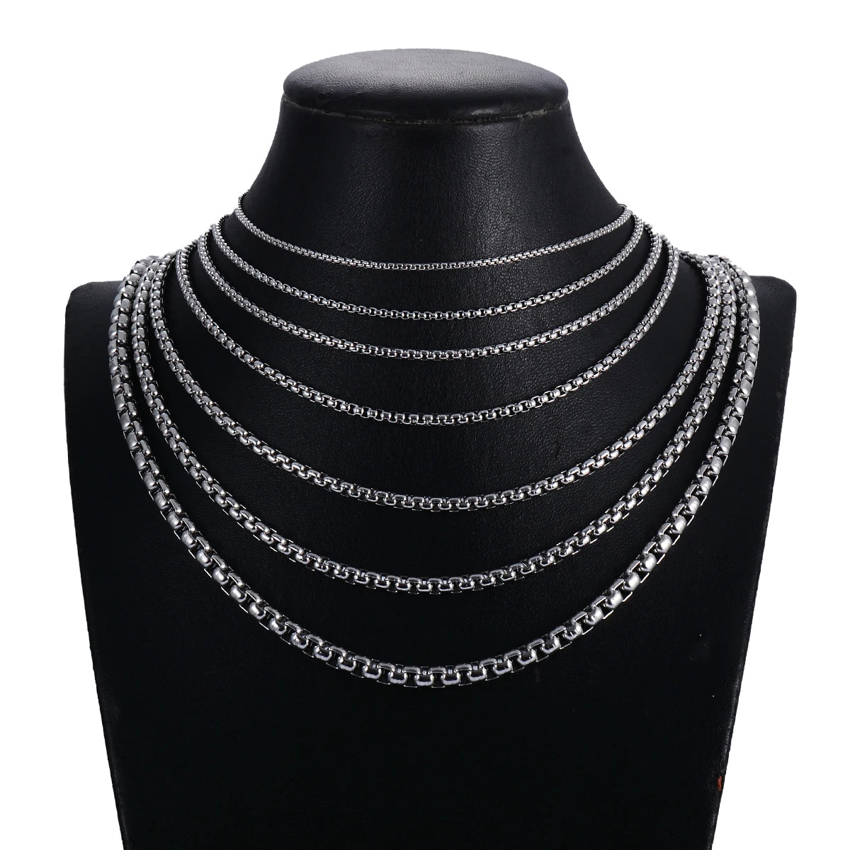 Stainless steel rolo chain necklace displayed on a jewellery bust