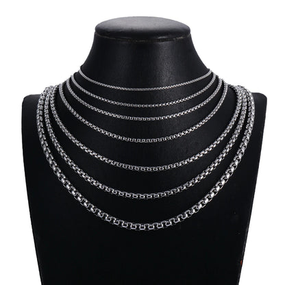 Stainless steel rolo chain necklace displayed on a jewellery bust