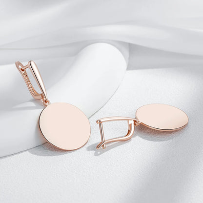 Sculptural Rose-Gold Round Drop Earrings