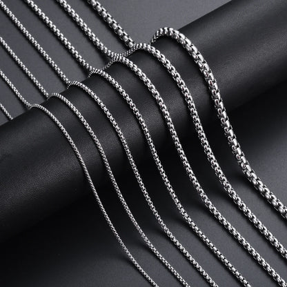 Stainless steel chain necklace shown in multiple widths