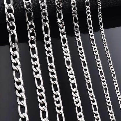 Silver-tone chain necklace width options on dark background